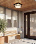 Outdoor Semi Flush Light With A Slick Black Finish, 2 Light Exterior Ceiling Light With Satin Etched Cased Opal Glass installed on porch ceiling.