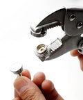 Heavy Duty Snap Setter Pliers Kit For Marine Snap Rings And Boat Cover Installation with pliers holding male snap part.