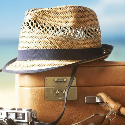 Woven straw hat resting on vintage suitcase with Old School Brass Hasp Latch For Jewelry Boxes And Wooden Lock Boxes Durable Antique Look Decorative Clasp For Furniture Decor Cabinets Chests And Craft Projects