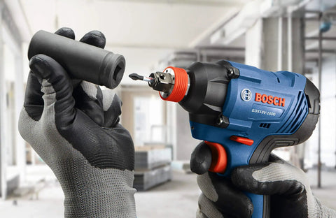 Worker using Two-In-One 18V Impact Driver Kit With 1/4 Inch Quick-Change Hex And 1/2 Inch Drive, Delivers Up To 1,600 In-Lbs Torque.