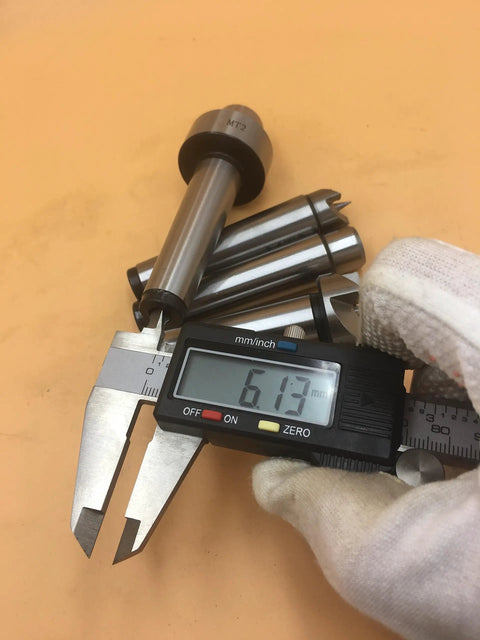 Heavy Duty MT2 Morse Taper Live Center And Drive Set For Wood Lathes with precision tips and caliper measuring 6.13mm.