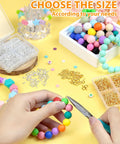 Hands using pliers on colorful beads with 600 pcs small eye pins for jewelry making and DIY crafts gold and silver 3 sizes.