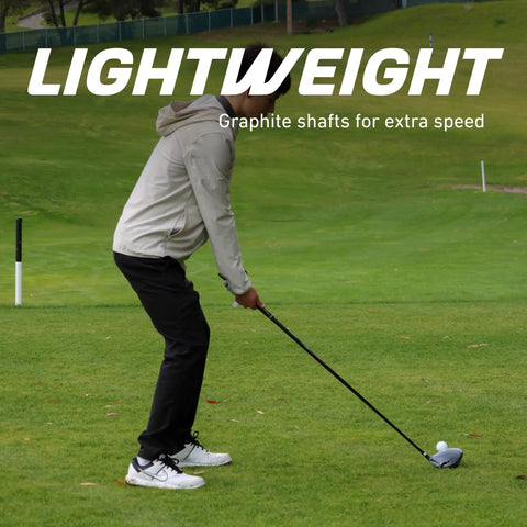 Teen Golf Club Set For Ages 13 To 16 with Titanium Driver and graphite shaft in golfer's hand on green field.