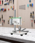 Straight Up Hella Precise Mini Bench Drill Micro Drilling Machine on table, showing adjustable speed adapter and metal frame.