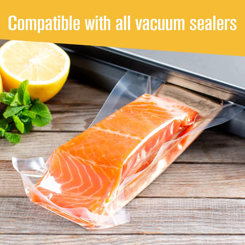 Two Pack Commercial Grade Vacuum Seal Bags And Rolls For Food Storage 8 Inch By 50 Feet And 11 Inch By 50 Feet Microwave And Freezer Safe Sous Vide Ready Keeps Leftovers Fresher Up To Five Times Longer Great For Meal Prep sealing salmon with lemon on wood table