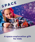 Child playing with Technic Surface Space Loader LT78 Building Set For Kids 8 And Up A Dope Space Vehicle With Crane And Raising Cab