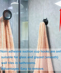 Heavy Duty Suction Cup Hook With Bombproof Grip For Window And Glass Walls featuring towel hanging on glass shower wall.