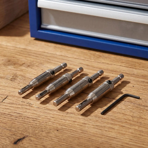Get Your Hinge Drilling Game Strong With This 4Pc Self Centering Drill Bit Kit featuring steel guide sleeves for precise drilling.