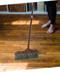 Long Handle Heavy Duty Broom With Soft Beveled Bristles For No Sweat Dust Removal And Quick Corner Cleanup Solid Workhorse Crushes Daily Kitchen Grime Indoors Or Outside Smooth Operator Approved, sweeping hardwood floor.
