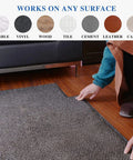Person applying Double Sided Carpet Tape Removable And Residue Free Rug Gripper For Hardwood Floors Clear Multipurpose