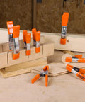 Heavy Duty Spring Clamp Set 4-Inch And 6-Inch Clamps With 1-Inch And 2-Inch Jaw Openings, 10-Piece Nickel-Plated Steel Clamps in use on wood