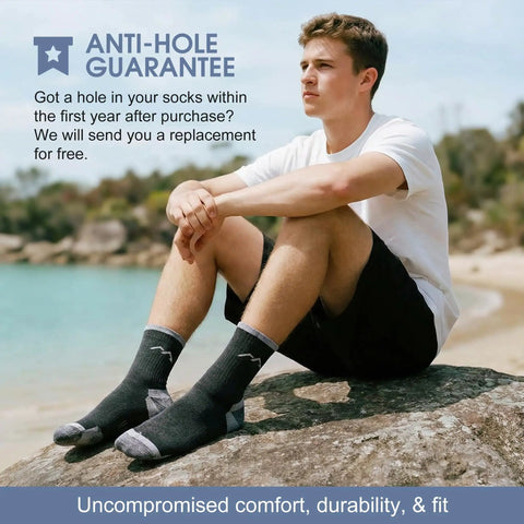 Man on beach wearing Men's Merino Wool Hiking Socks 3 Pack Micro Crew Cushioned Thermoregulating All Season Comfort