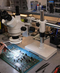Trinocular Stereo Zoom Microscope 3.5X to 90X With Led Lighting 45 Degree Rotating Head and 360 Degree Trinocular Port for Digital Cameras or Touch Screens Interpupillary Range 54 to 76mm Eyepiece With Six Diopter Adjustment used for PCB inspection