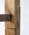 Close-up of carbonized wood joinery on garden arbor for outdoor weddings, showing sturdy construction and weather-resistant finish.