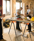 Heavy Duty Foldable Saw Horses 2 Pack Supporting 1322 Lbs With Toughened Steel Rig and Quick 2x4 Workbench Hooks in workshop.
