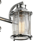 Close-up of a chrome fixture with ribbed seeded glass shade for Three Light Vanity Light In Chrome With Ribbed Seeded Glass Shades For A Coastal Bathroom Vibe, Modern Chrome Finish, Bulb Not Included, Premium 3 Light Bath Fixture For Sleek Easy Lighting Upgrade.