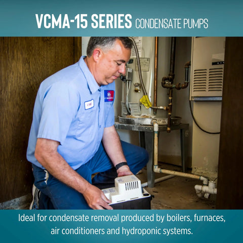 VCMA-15 condensate pump with white housing being installed by HVAC technician in equipment room