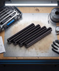 High Temp Automotive Vacuum Lines Kit Withstands 43 PSI And Extreme Heat To Stop Melting Cracking For Easy Tool-Free Diy Engine Bay Upgrades That Save Time And Money On Tough Car Repairs black hoses on a workbench