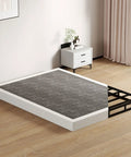 Full Size Box Spring And Mattress Foundation 5 Inch Low Profile Heavy Duty Metal Bed Base in minimal bedroom setting.