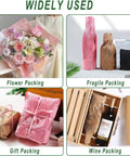Green Eco Friendly Honeycomb Packing Paper Cushioning Wrap 12 Inch By 200 Ft Kraft Paper Biodegradable And Recyclable For Moving And Gift Wrapping With 20 Fragile Labels shown used for flower, fragile, gift, and wine packing.