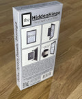 Hella Easy Invisible Picture Frame Hinges For Wall Safes And In Wall Stash Spots Patented box packaging displaying installation images.