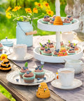 Tiered tray decorated with cupcakes and 10 Pack Unfinished Wood Beehive Decor Mini Beehives For DIY Paintable Honeycomb farmhouse