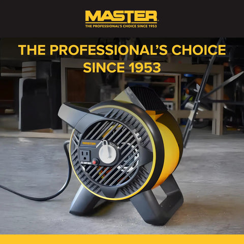 Heavy Duty Utility Blower With 3 Speed Portable Floor Fan, pivoting head, built-in outlet, rugged construction in workshop setting