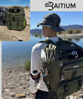 Go To Fishing Backpack Tackle Bag With Rod Holders And Built In Cooler 40L viewed on person's back by lakeside.