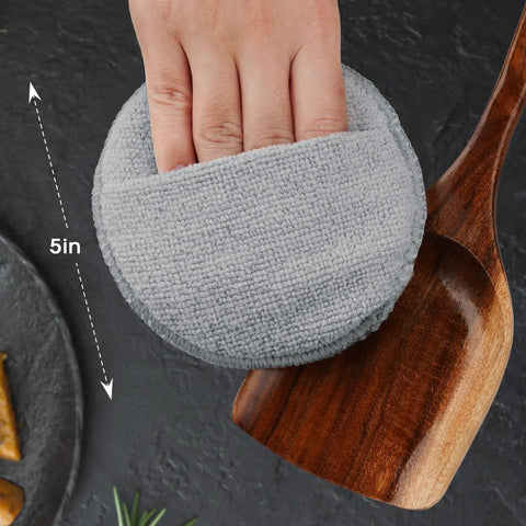 Heavy Duty Five Inch Microfiber Wood Conditioner Applicator Pads For Cutting Board Wax And Oil Spreaders On Point Kitchen Essentials No Sweat Daily Cook Gear Four Pack with gray microfiber pad and wooden spoon.