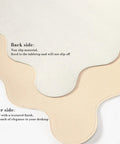 Extra Large PU Leather Desk Pad With Scalloped Edges, Waterproof Non Slip Desk Protector Mat For Office And Home, Large Mouse Pad With Stitched Border, Beige Tone For A Calm, Modern Workspace, showing non-slip back and textured front.