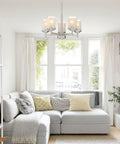Modern Farmhouse 19 Inch 5 Light Chandelier in Brushed Nickel Finish with Frosted White Linen Glass Shades in living room setting
