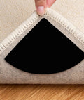Non Slip Rug Pad Grippers For Round Rugs Reusable Washable Double Sided Tape Keeps Your Rug Flat Prevents Curling On Hardwood And Tile Floors Easy Peel And Stick Durable Black No Fuss. Visibility: black pad between rug and floor under lifted corner.
