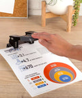 Using 2 Hole Punch For Papers With 28 Sheet Capacity, Durable Metal Construction, Comfortable Padded Handle on an office report