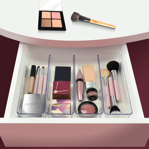 Clear Drawer Organizer Set Four Piece Modular Bins For Office Home Makeup Kitchen And Junk Drawer Storage Crystal Clear Plastic Durable And Stackable For Easy Access Boss Level Neat Drawers used for makeup storage in a drawer.