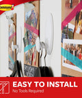 Damage Free Wall Hanger System With 7.5 Lb Capacity on wall holding plastic hangers with photos displayed around it