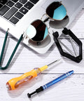 4 Piece IC Chip Remover Set with 4 Claw PLCC Puller and Keyboard Switch Test Pencil on a laptop keyboard