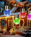 8 Pack Solar Hanging Lights Outdoor Waterproof Lanterns For Garden Decor Color Changing Cracked Glass Yard Fence And Trees Perfect Gift For Women Weatherproof And Easy To Install Lit Glow hanging from snowy branch