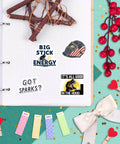 100 Piece Welder Sticker Set For Helmets Laptops Water Bottles And More Durable Vinyl Welding Stickers For Hard Hats Windows And Gear No Residue Easy Peel Gift For Welders Women And Men featuring 'Big Stick Energy' design on a notebook.
