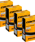 Race 28 Inch Wide Inner Tubes 700x25-32c With 42mm Presta Valve Pack Of 4 Includes Sticker Seamless Mold-Cured Construction For Smooth Rides And Fewer Flats, showing four orange boxes side by side