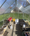 Greenhouse interior with Greenhouse Drip Irrigation Kit With 20 Brass 360 Degree Adjustable Nozzles, 65 Ft 1/2 Inch Tubing visible