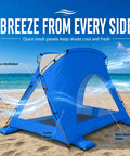 Blue Portable Beach Sun Shelter For 2 To 8 People, UPF 50 Plus UV Protection with mesh panels, on a sunny beach.