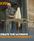 Man using Centipede Work Stand Table Top For Portable Workbench 24 By 48 Inches With Wood Top 20mm Dog Holes And 6 Quick Twist Lock Handles