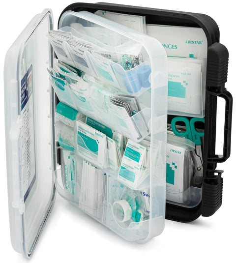 Open front view of large wall-mountable first aid kit cabinet with transparent pocket organizer and teal medical supplies