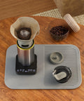 Exagram Pro Coffee Scale With Timer And Carrying Box on wooden table with brewing setup