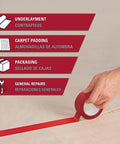 Hand applying red underlayment seam tape for floating floors, showing versatility for carpet padding and general repairs.