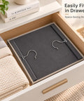Heavy Duty Six Shelf Hanging Closet Organizer With Roomy Side Pockets And Foldable Design in drawer with folded blankets.