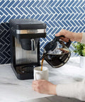 Speed Brew Elite 10 Cup Coffee Maker With Internal Stainless Steel 70 Oz Hot Water Tank Quick Brew Technology shown in use on counter
