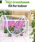 Indoor Mini Greenhouse Kit With Adjustable Led Grow Light And Timer Tabletop Garden Starter showcased on a porch