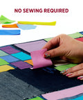 Fabric Fusion Glue 4 Ounce Permanent And Washable No Sew Fabric Glue For Clothing Denim Cotton Polyester And Flannel Dries Flexible on colorful fabric pieces.