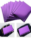 Purple Self Seal Bubble Mailers 18x23cm, 10 Pack, Thickened Aluminum Foil Padded Envelopes displayed in a stack and individually in boxes.